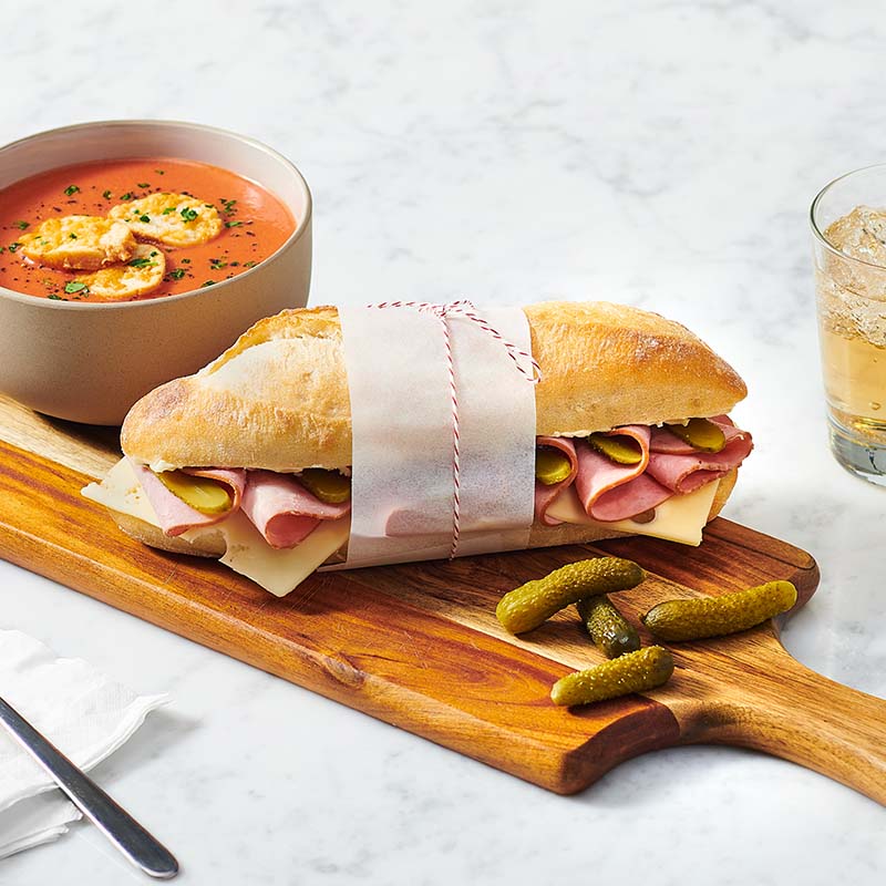 Traditional French-style white baguette in a demi size, ideal for foodservice sandwiches. 8" x 3". Serve as a jambon beurre!