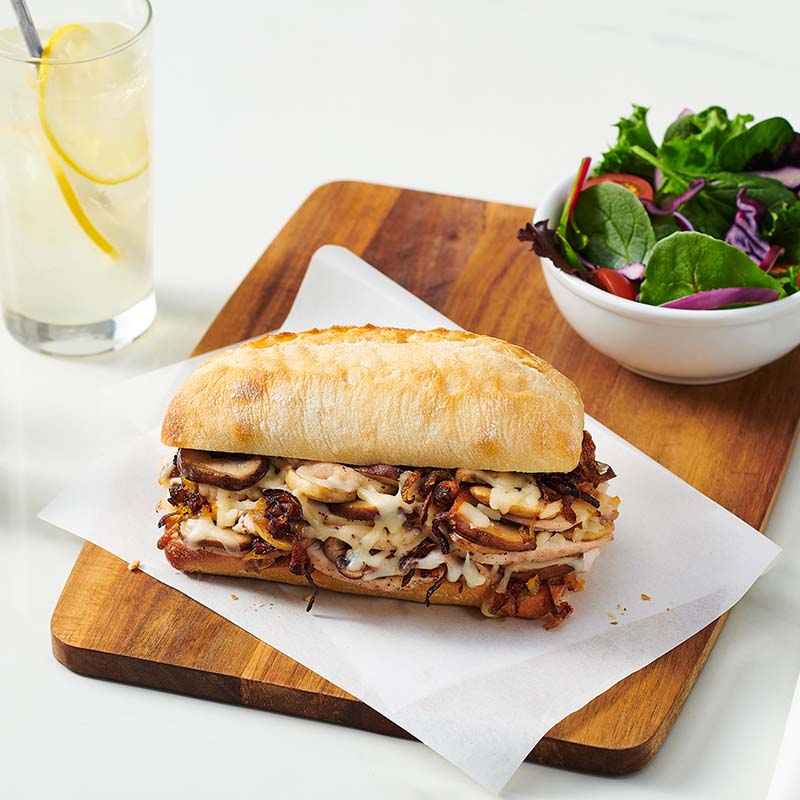 A rustic, tasty small foodservice ciabatta roll with a moist airy interior and a crisp golden crust. 6" x 3".