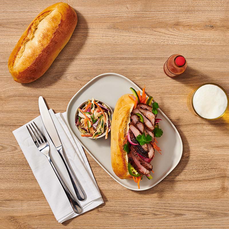 A rustic, tasty loaf with a moist airy interior and a crisp golden crust. 7" x 3". Serve as a Cheesy Breakfast Dipper!