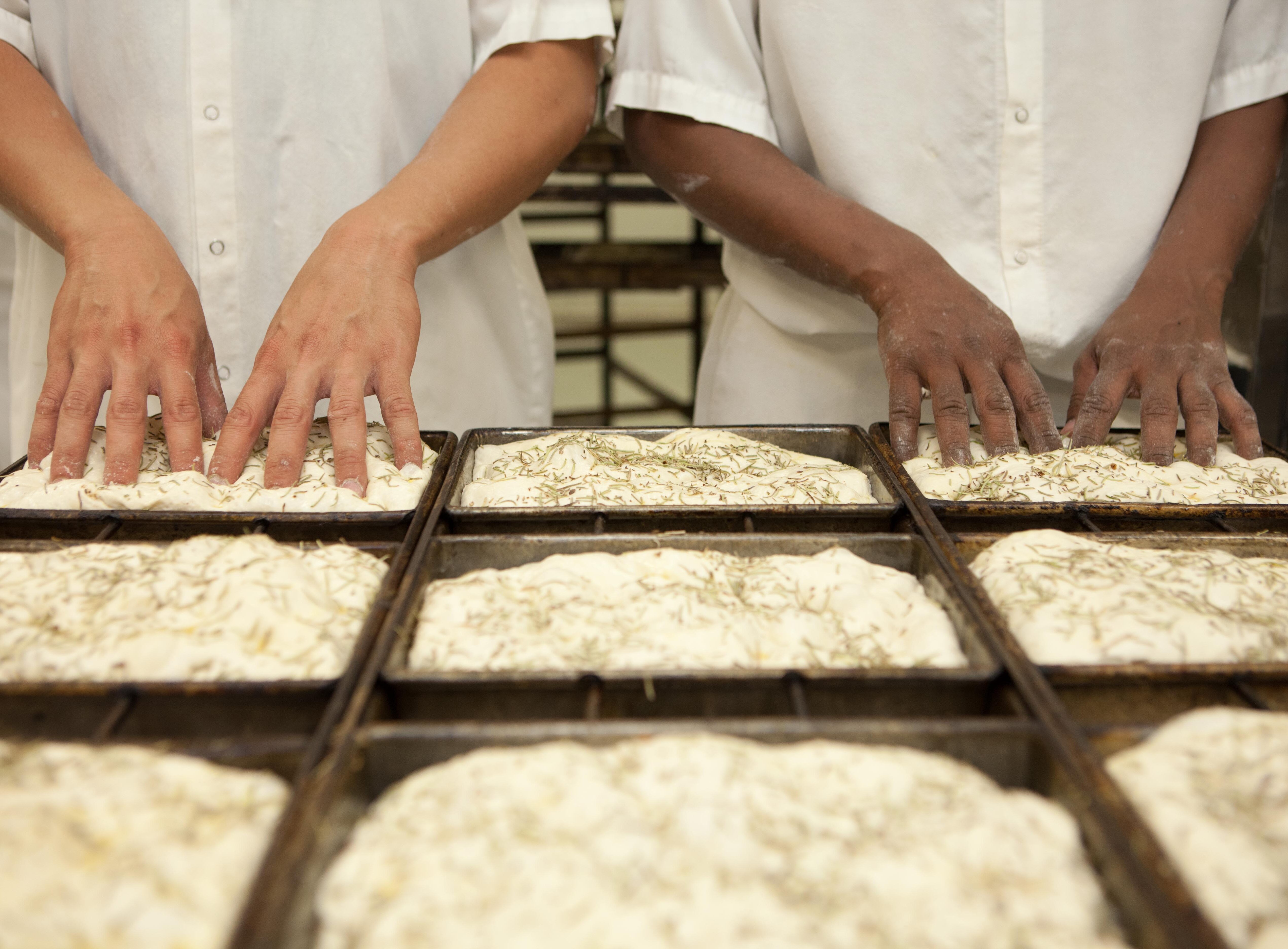 Foodservice Factory workers kneading dough. Clean label, simple ingredients, artisan quality, menu inspiration.